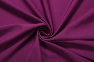 Close-up view of the soft purple fabric texture and drape of a stylish long dress.