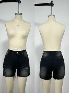 Pantalones cortos vaqueros negros rotos con dobladillo deshilachado para mujer