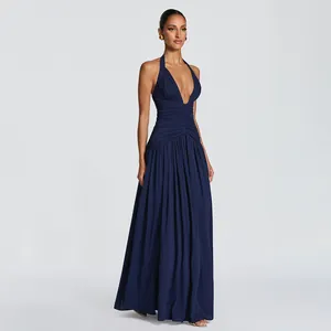 Elegant navy blue halter neck backless pleated maxi evening gown for stylish women.