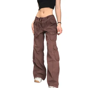 Detailed shot of women's vintage brown multi-pocket cargo pants featuring a wide-leg cut