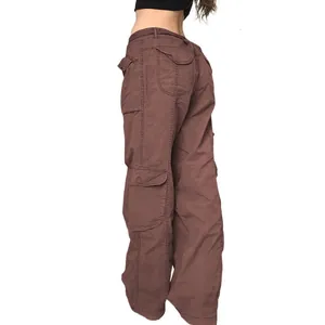Detailed side view of brown American retro wide-leg cargo pants with multiple pockets