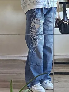 Jean décontracté bleu délavé avec imprimé graphique cœur blanc de style streetwear