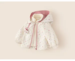 Girl's colorful polka dot hooded windbreaker with bunny detail and fleece lining