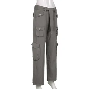 Detailed side view of vintage grey multi-pocket cargo pants for women with straight leg