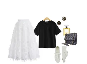 White leaf pattern hollow-out midi skirt styled in a black and white fashion outfit