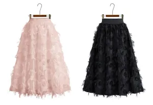 Elegant high-waisted A-line skirts with intricate leaf-like fringe texture