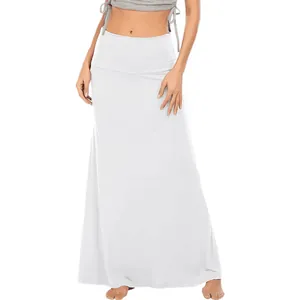 Close-up detail of a white high-waisted long maxi skirt in comfortable casual jersey fabric
