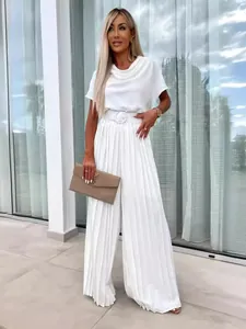 Elegant white pleated wide-leg jumpsuit with matching belt for women's casual style
