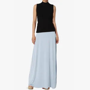 Elegant high waisted light blue maxi skirt paired with black sleeveless turtleneck top
