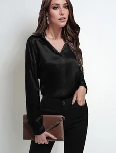 Model shot of elegant black satin blouse, highlighting professional fit and silky texture