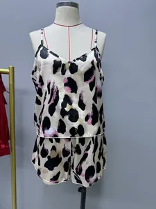 Full view of satin leopard print pajama set including camisole top and shorts