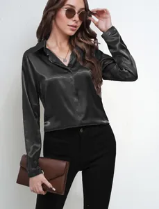 Elegant black satin long-sleeved shirt for women, perfect for office commuter style.