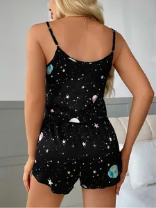 Back view of women's satin camisole pajama set with space planet and star print