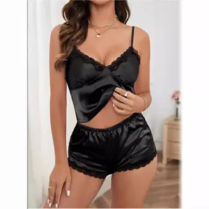 Elegant black satin camisole top and matching lace-trim shorts sleepwear set for women