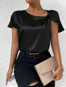 Close-up of elegant black satin short sleeve top featuring a shoulder twist detail.