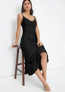 Elegant black satin slip dress featuring a deep V-neck and a slim-fit midi silhouette