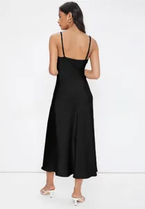 Elegant black satin midi slip dress featuring thin straps and detailed back view on model