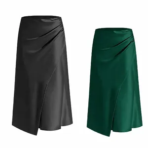 High-waisted satin pleated midi skirt with asymmetric slit in elegant black and dark green