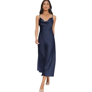 Elegant navy blue satin cowl neck slip dress for women shown on model in studio setting