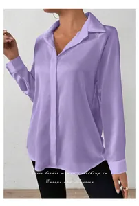 Close-up detail of a lavender satin long sleeve shirt with soft silk-like texture