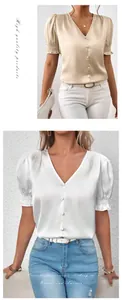 Detail view of women's satin V-neck shirt with puff sleeves and elegant button-down design