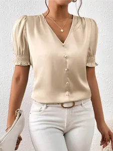 Elegant champagne satin V-neck blouse with short puff sleeves and ruffled cuffs