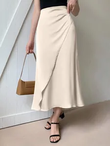 Elegant cream satin midi skirt with wrap front detail and a high waist design for women