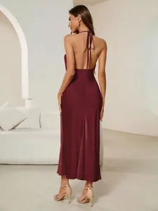 Elegant wine red satin backless midi dress featuring thin halter straps and open back