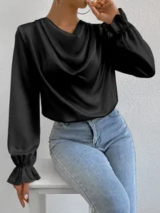 Elegant black satin blouse with long sleeves, draped cowl neck, and ruffled elastic cuffs.