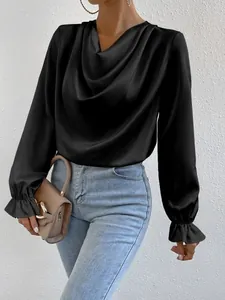 Elegant black satin blouse featuring a graceful cowl neck and stylish ruffle cuffs detail