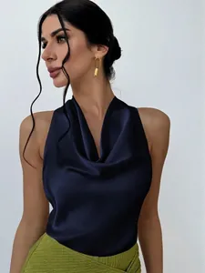 Close-up of navy blue satin sleeveless shirt with elegant cowl neck and glossy finish.