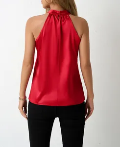 Back view detail of a vibrant red satin halter neck sleeveless top featuring elegant pleats