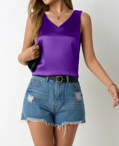 Sleek purple satin V-neck sleeveless tank top paired with casual blue denim shorts