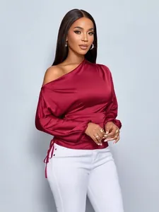 Elegant wine red satin one-shoulder blouse with long sleeves and gathered cuffs