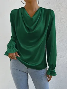 Detailed view of elegant dark green satin long sleeve blouse featuring a cowl neck design