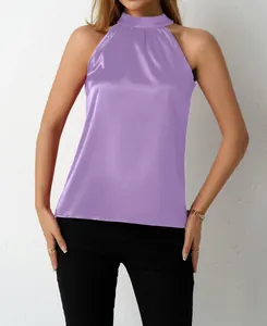 Close-up view of the purple satin halter neck top showing elegant fabric sheen and fit.