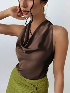 Detail view of brown satin cowl neck sleeveless top showing luxury fabric texture