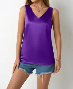 Detail view of a purple satin sleeveless top with elegant V-neck and glossy finish