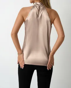 Elegant back view of champagne satin halter top with keyhole and button closure
