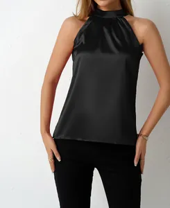 Detailed view of elegant black satin halter top with sleeveless summer design
