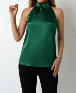 Close-up detail of a dark green satin halter neck sleeveless top for women.