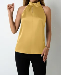 Close-up of elegant gold satin halter neck top with V-neck detail for women