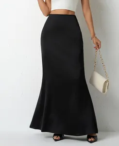Elegant high-waisted black satin maxi skirt showing luxury fabric texture and drape