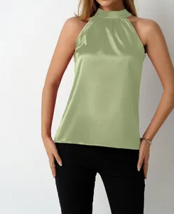 Elegant light green satin halter top for women featuring a smooth silky sheen finish.