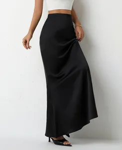 Elegant long black satin skirt featuring a smooth silk-like texture and high waist detail