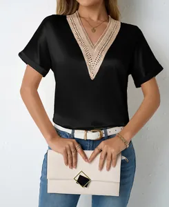 Detail of black V-neck satin t-shirt with elegant lace trim and smooth finish