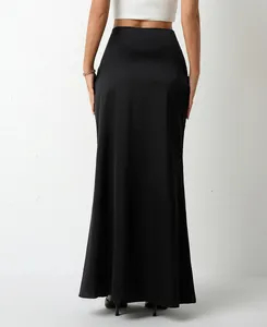 Back view of an elegant black satin maxi skirt showing smooth texture and drape