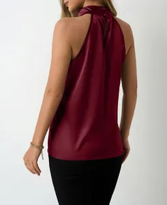 Back view of an elegant burgundy satin halter neck sleeveless top featuring button closure