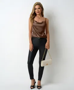 Elegant brown satin cowl neck camisole shown on model for summer fashion style