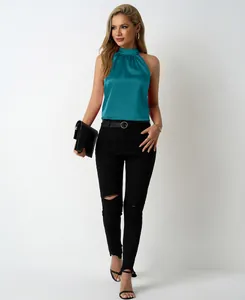 Elegant teal satin halter neck top for women featuring high shine fabric and shirred neck.